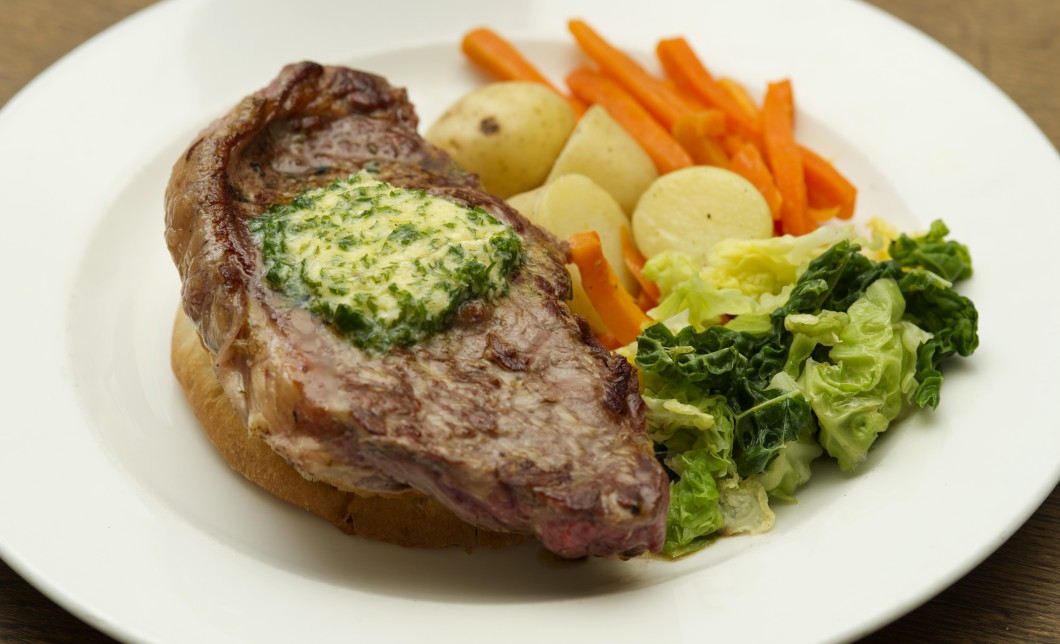 Mandatory Credit: Photo by Christopher Jones/REX Shutterstock (5219592l) Sirloin steak with horseradish butter and vegetables Food - Sep 2015