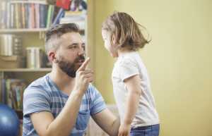 Young father with his cute little daughter