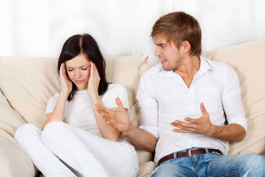 beautiful young couple sitting on a sofa