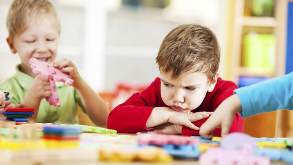 Small angry looking boy looking at the toys. [url=http://www.istockphoto.com/search/lightbox/9786682][img]http://dl.dropbox.com/u/40117171/children5.jpg[/img][/url]