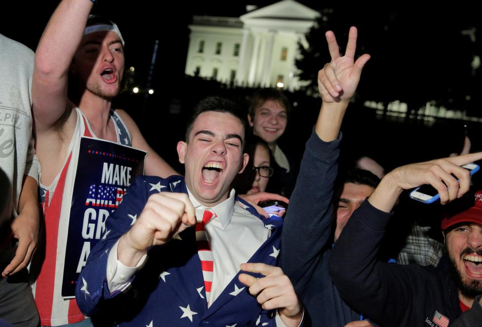 Supporters of Republican presidential candidate Donald Trump rally in front of the White House in Washington.