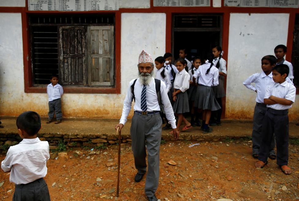 The Wider Image: Nepal's 68-year-old student