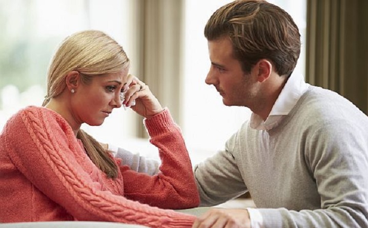 Couple With Woman Suffering From Depression