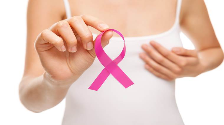 Woman with breast cancer awareness ribbon