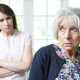 Serious Senior Woman With Adult Daughter At Home