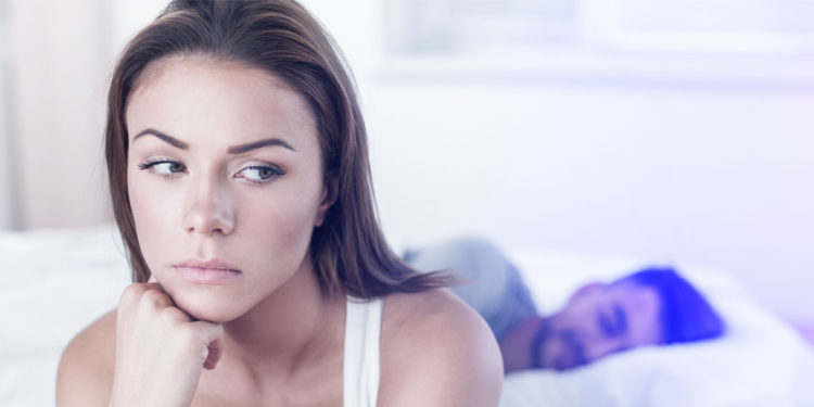 disappointed-sad-woman-in-bed-with-man-750x375