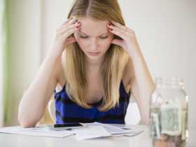 financial-stress-woman-56a905265f9b58b7d0f75ecc